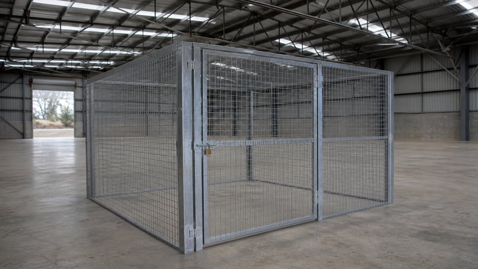 A locked steel security cage inside a warehouse used for controlled destruction