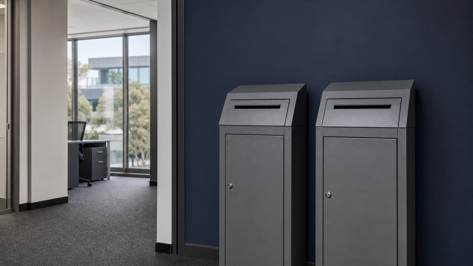 Secure lockable document destruction bins in an office corridor