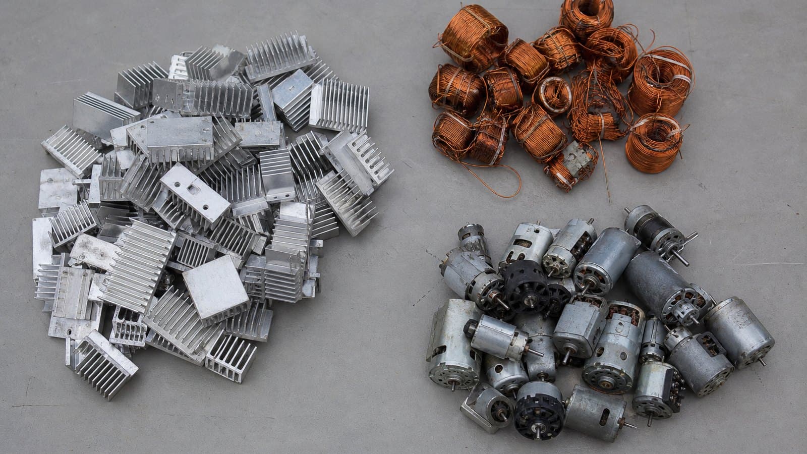 Recovered heatsinks, copper windings and small motors from electronic equipment